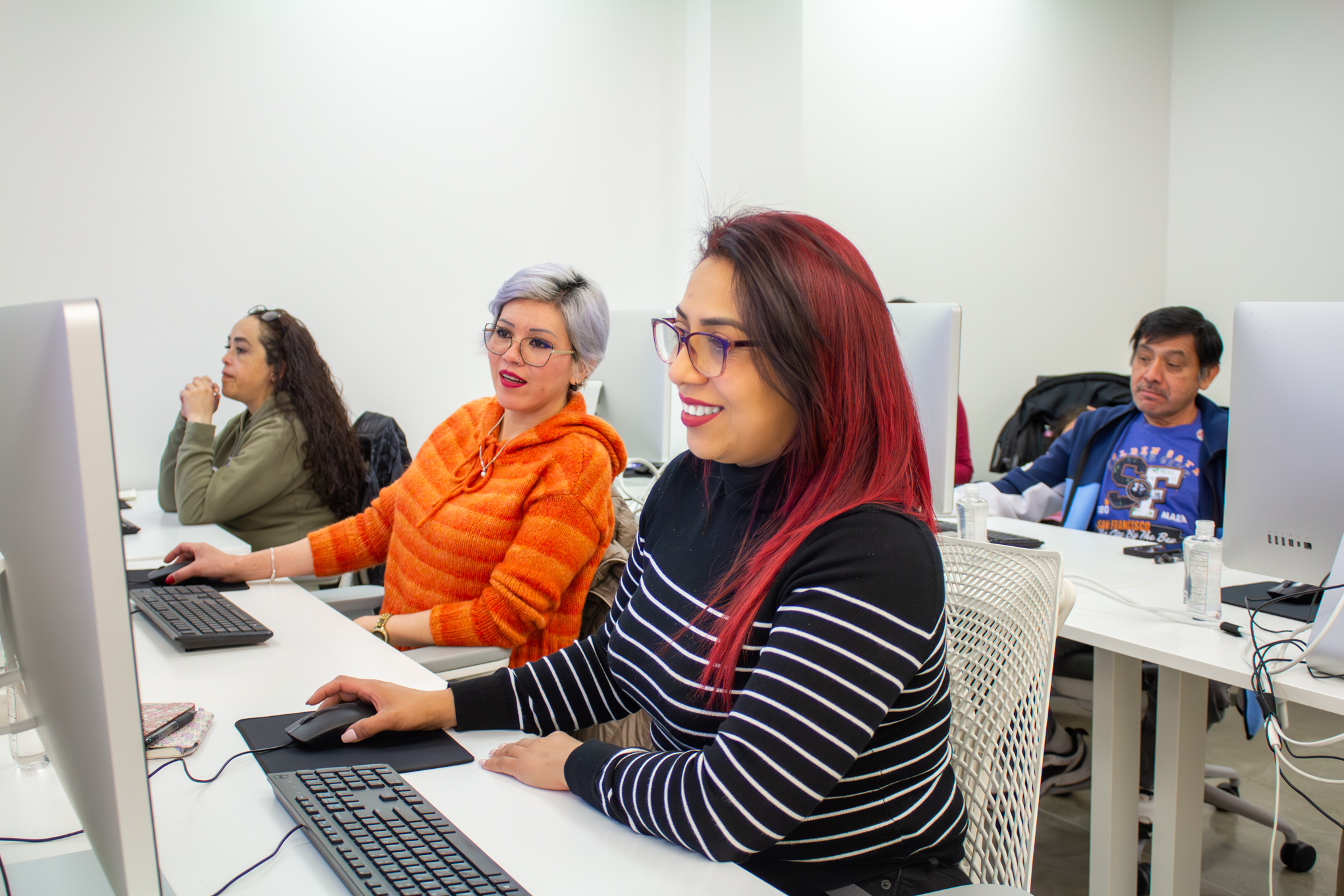 Student is conent with what she is learning through our free Digital Literacy Classes. Sign Up Now!