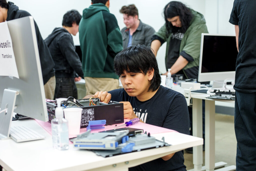 Trainee taking apart a PC